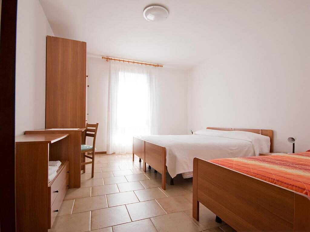 Guest room with wooden furniture